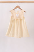 Oatmeal character french knot ruffle dress